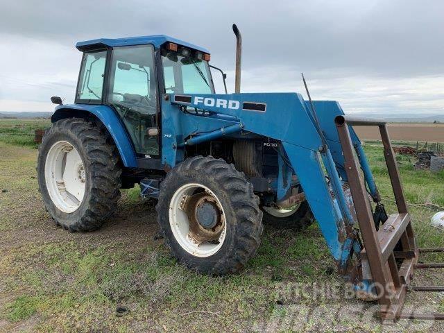 New Holland 7740 MFWD Tractor w/ loader Tractors