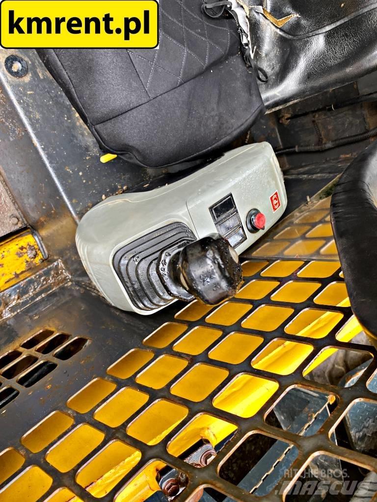 Komatsu SK 815 Minicarregadeiras