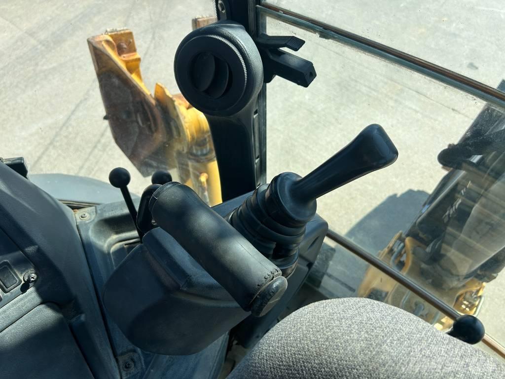 John Deere 310K Retroescavadeiras