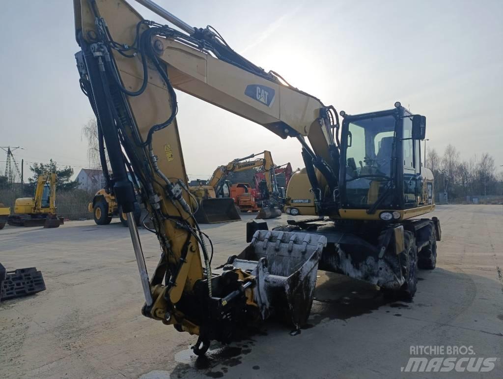 CAT M 313 D Escavadoras de rodas