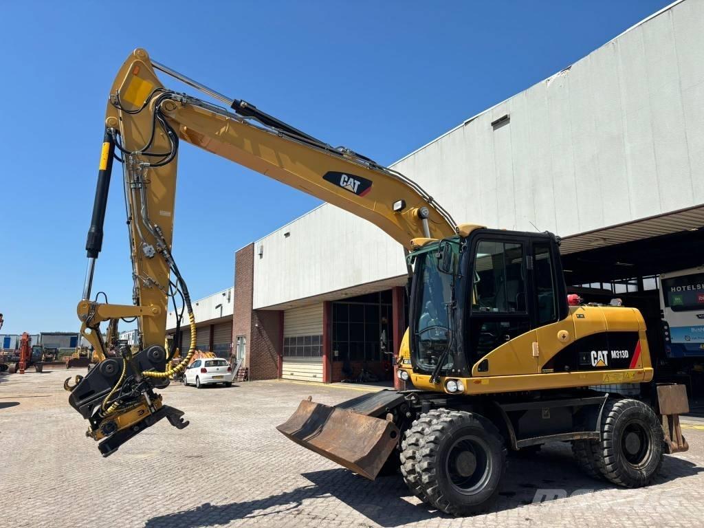 CAT M 313 D Escavadoras de rodas