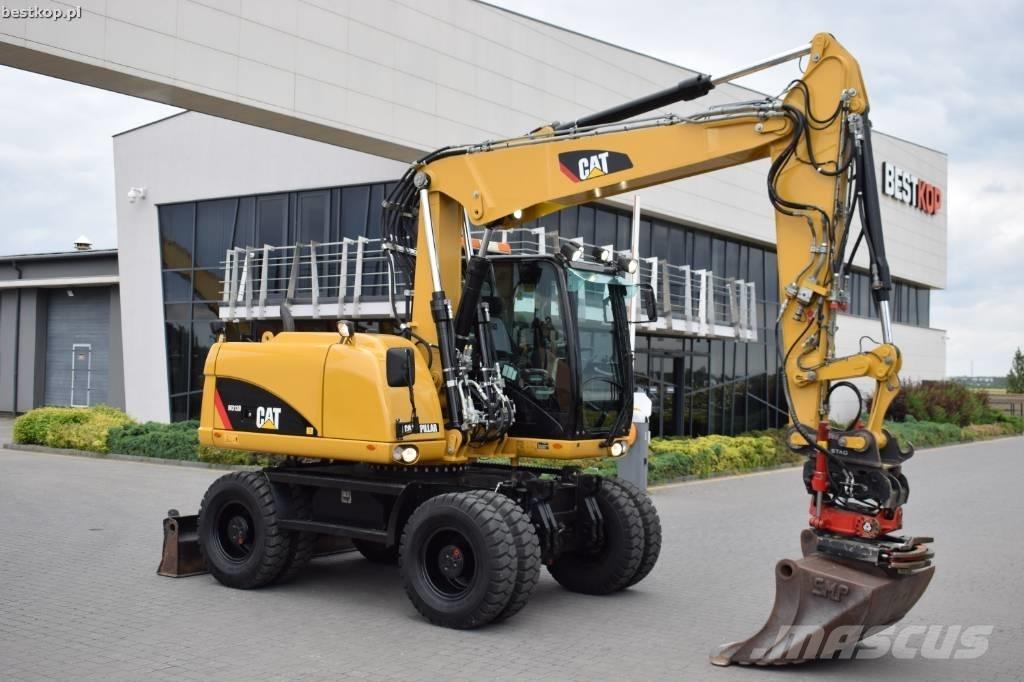 CAT M 313 D Escavadoras de rodas