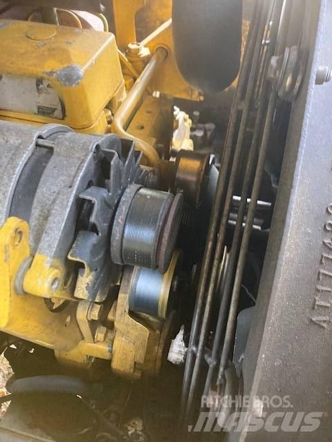 John Deere 200 LC Desgalhadores