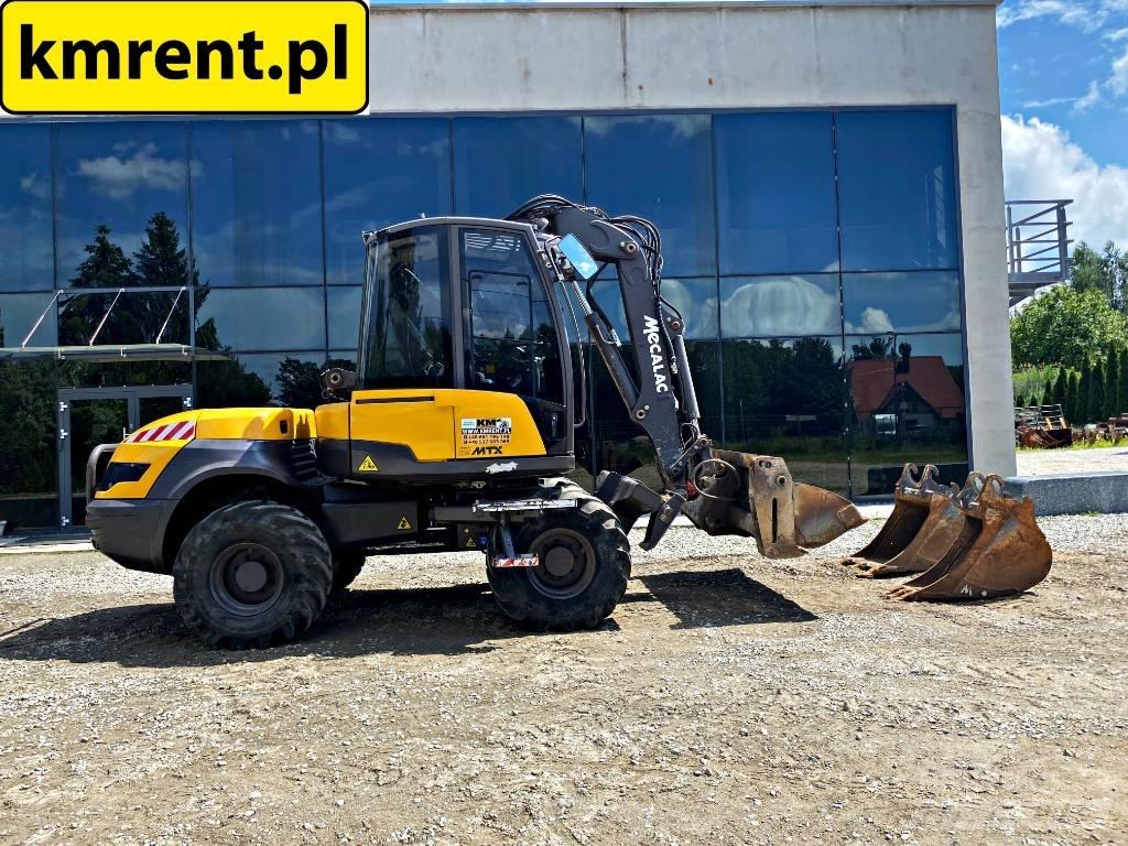Mecalac 12 M TX Retroescavadeiras