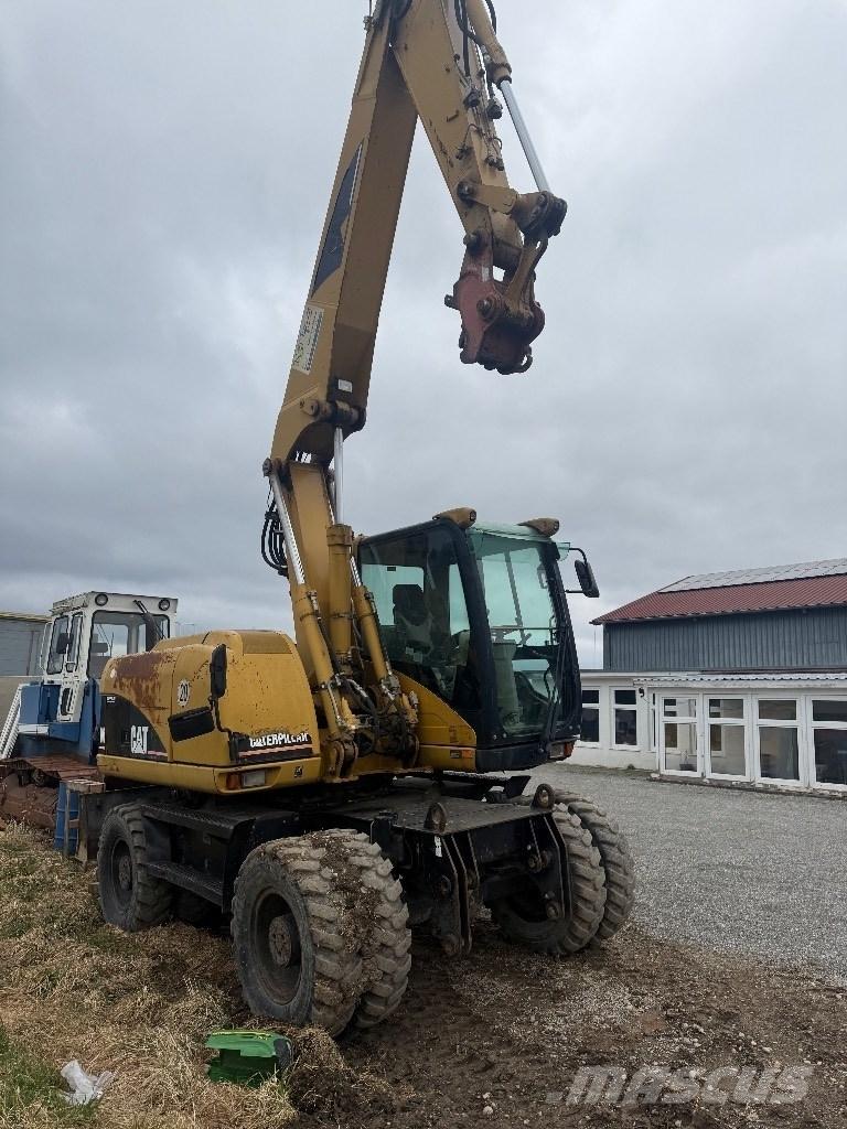 CAT M 313 C Escavadoras de rodas