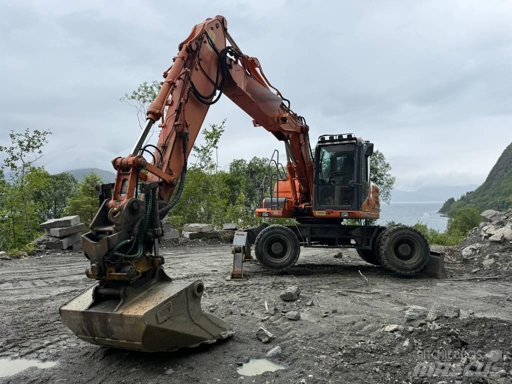 Doosan 140 W Escavadoras de rodas