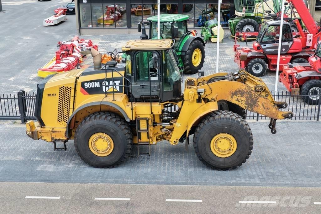 CAT 980M shovel + Bak Carregadeiras de rodas