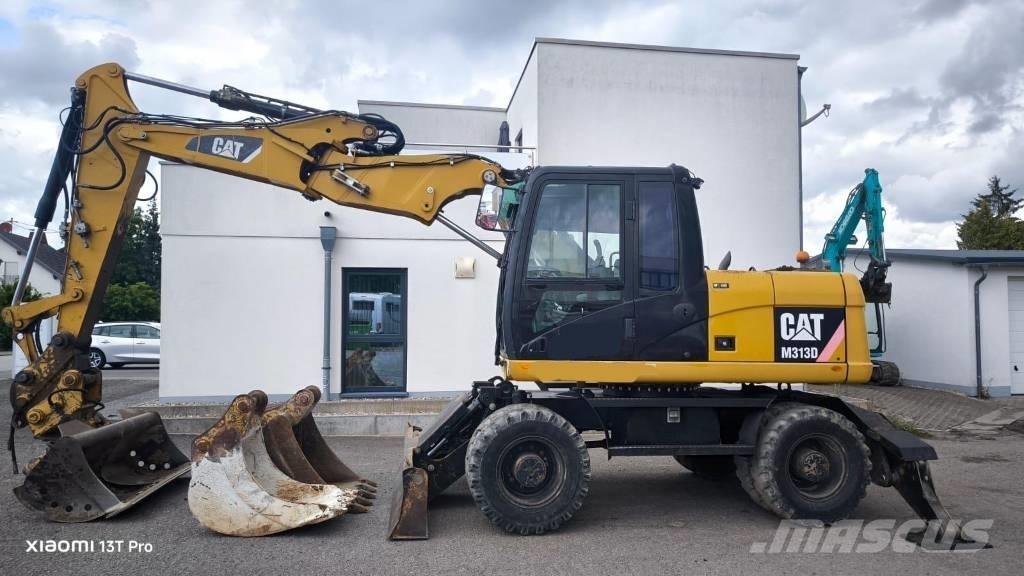 CAT M 313 D Escavadoras de rodas