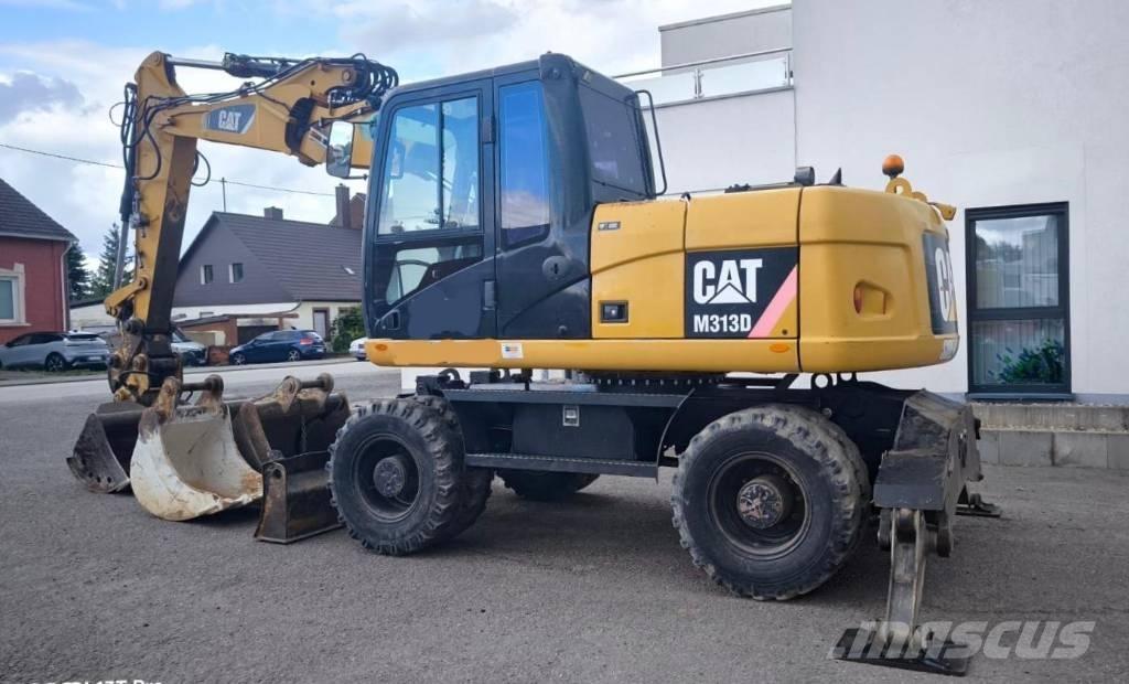 CAT M 313 D Escavadoras de rodas