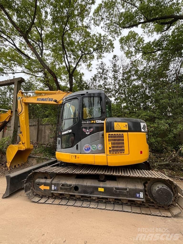 CAT pc 128us Escavadoras Midi 7t - 12t
