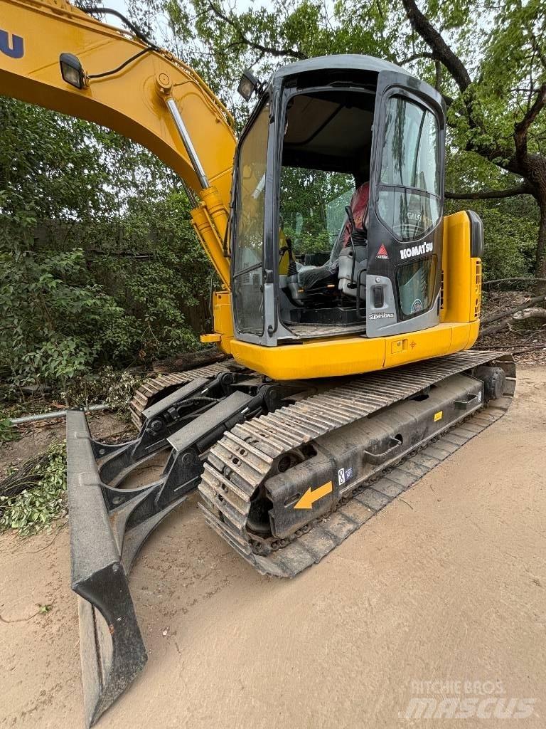 CAT pc 128us Escavadoras Midi 7t - 12t