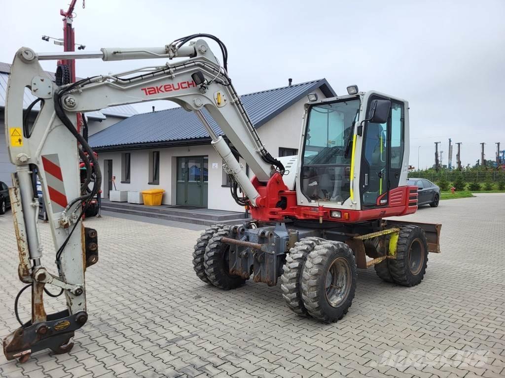 Takeuchi TB295W Escavadoras Midi 7t - 12t