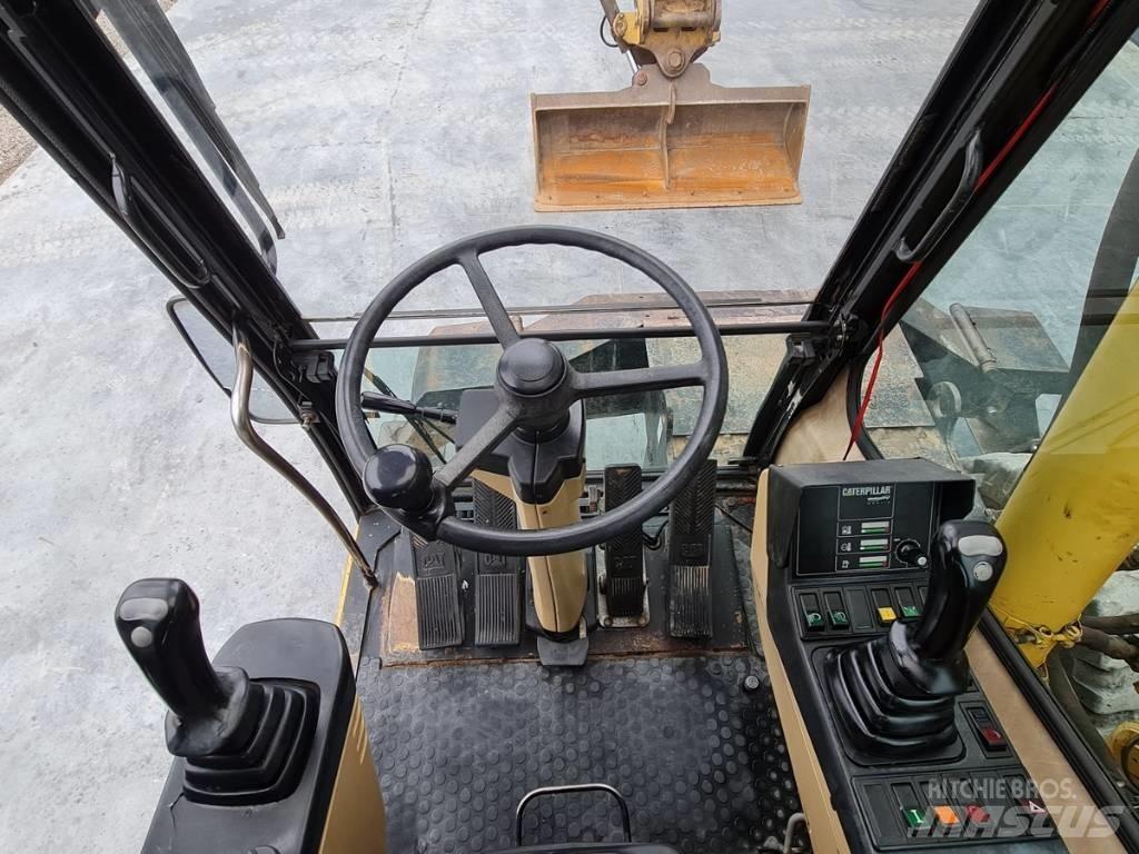 CAT M 312 Escavadoras de rodas