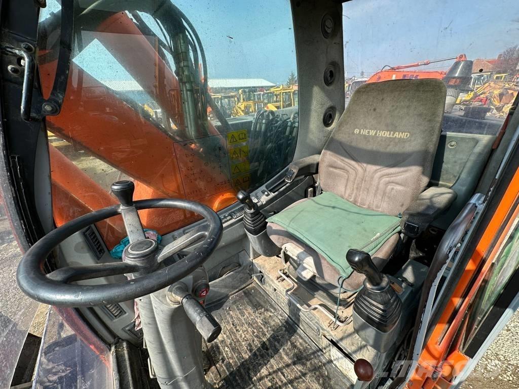 New Holland MH Plus Escavadoras de rodas