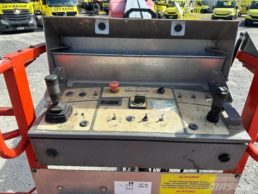 SkyJack SJ66T Elevadores braços articulados