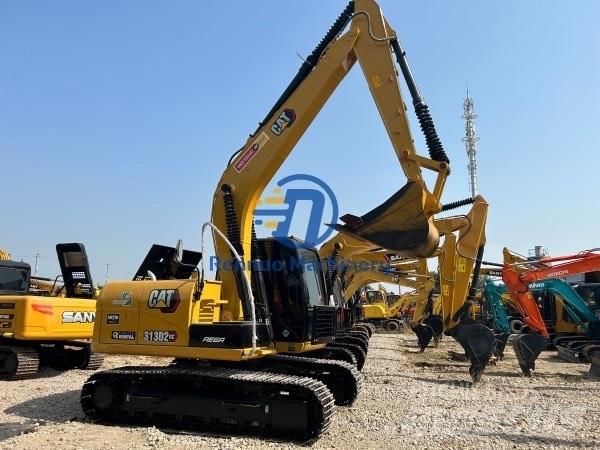 CAT 313 Escavadoras Midi 7t - 12t