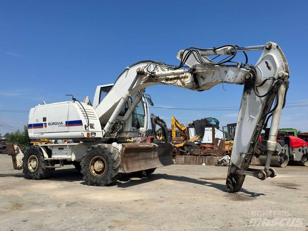 New Holland MH Plus Escavadoras de rodas