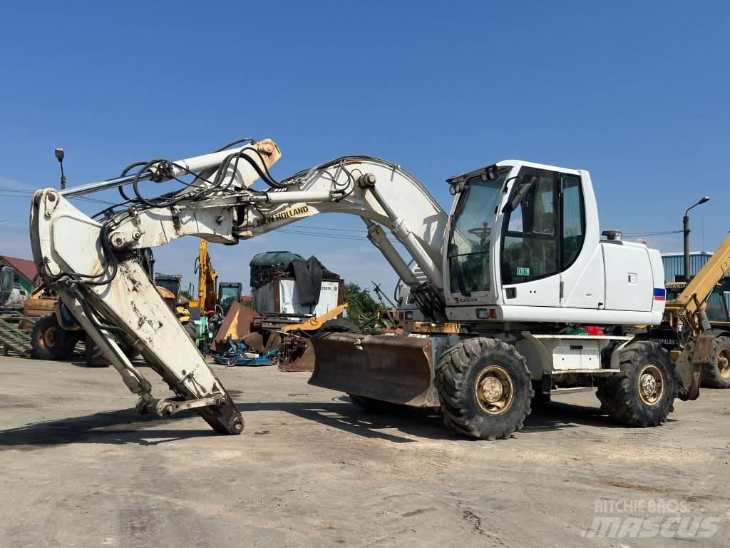 New Holland MH Plus Escavadoras de rodas