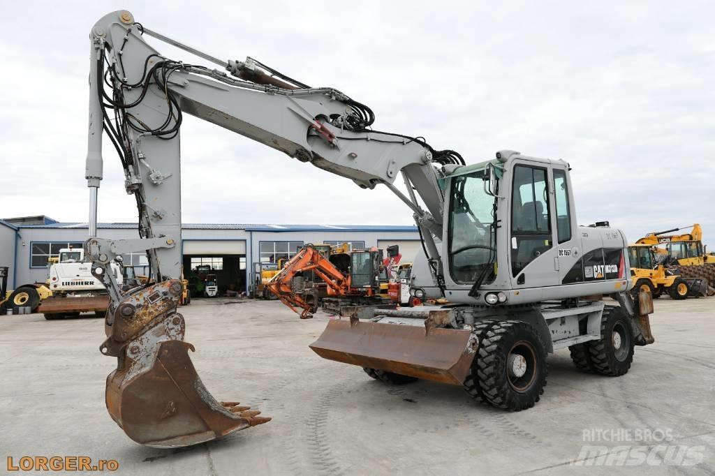 CAT M 313 D Escavadoras de rodas