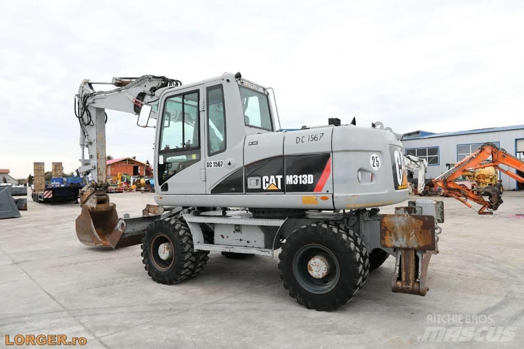 CAT M 313 D Escavadoras de rodas