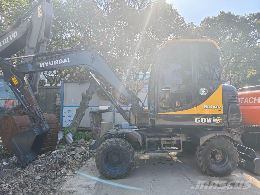 Hyundai 60 W VS Miniescavadeiras