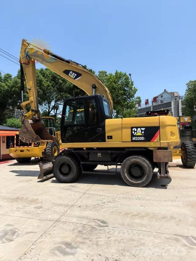 CAT M 320D2 Escavadoras de rodas