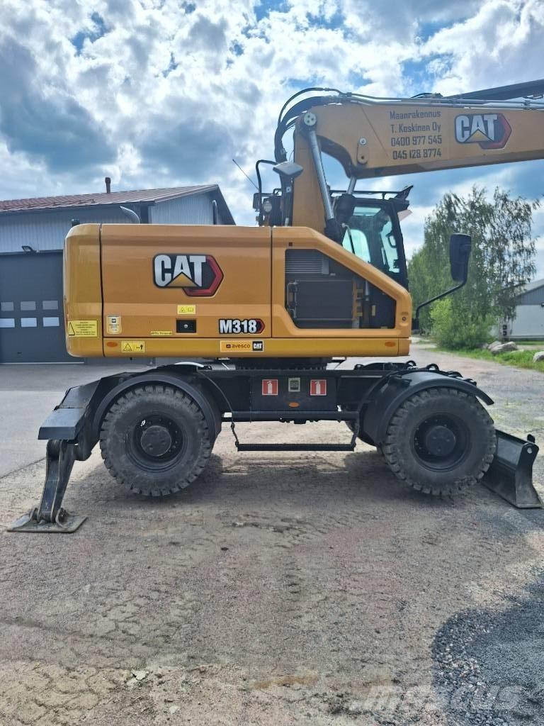 CAT M 318 Escavadoras de rodas