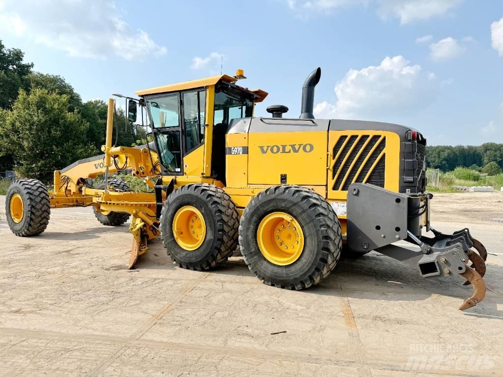 Volvo G970 + RIPPER Motoniveladoras