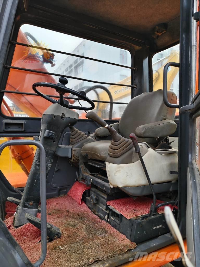 Hitachi EX 100 W D Escavadoras de rodas