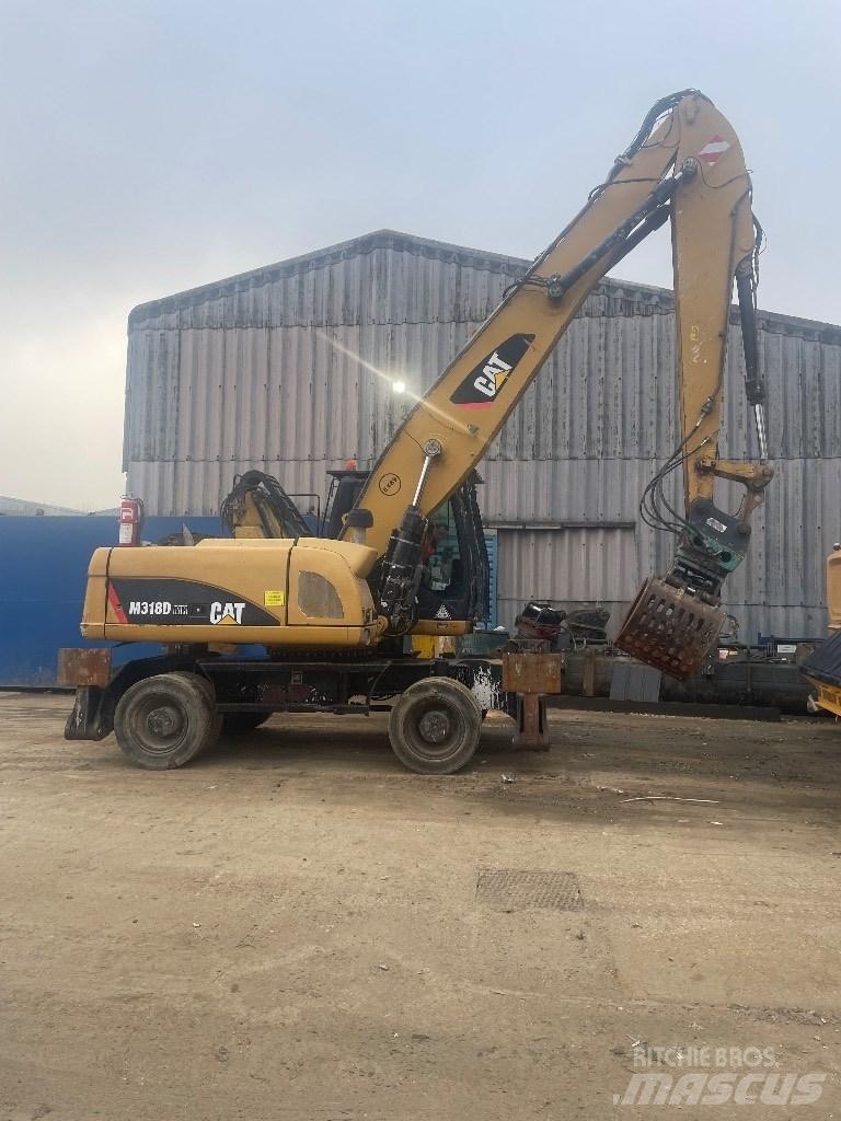 CAT 318 dmh Movimentação cargas - Outros
