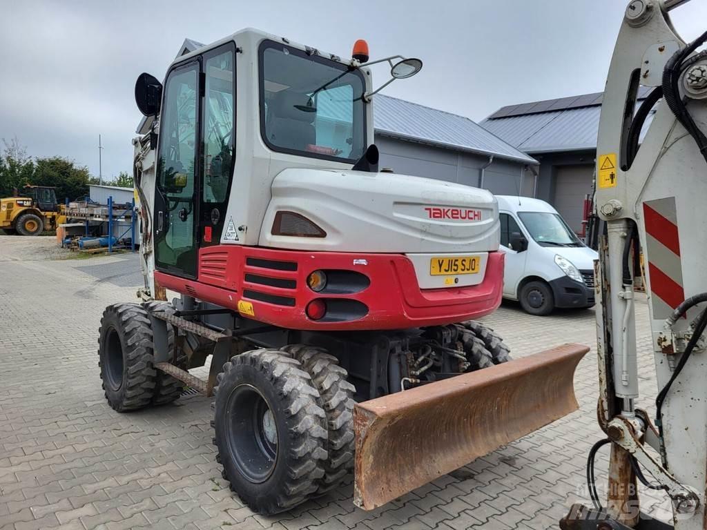 Takeuchi TB295W Escavadoras Midi 7t - 12t