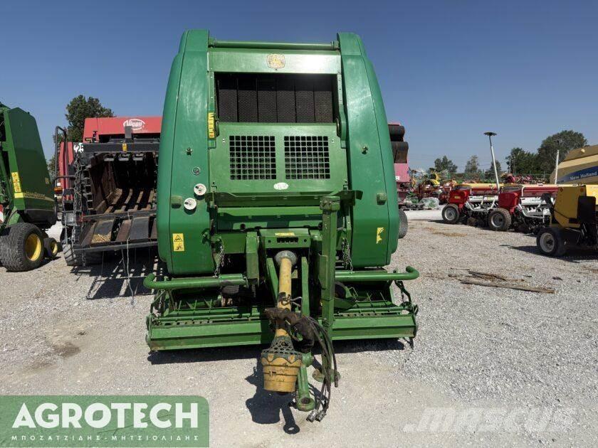 John Deere 864 Enfardadeira de rolos