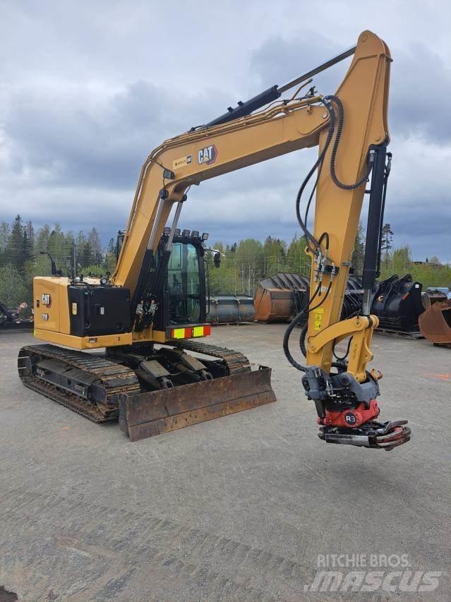 CAT 310 Miniescavadeiras