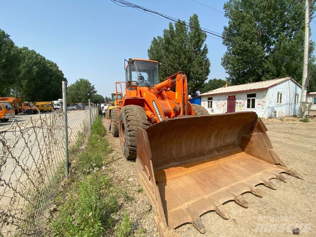 Doosan DL503 Retroescavadeiras