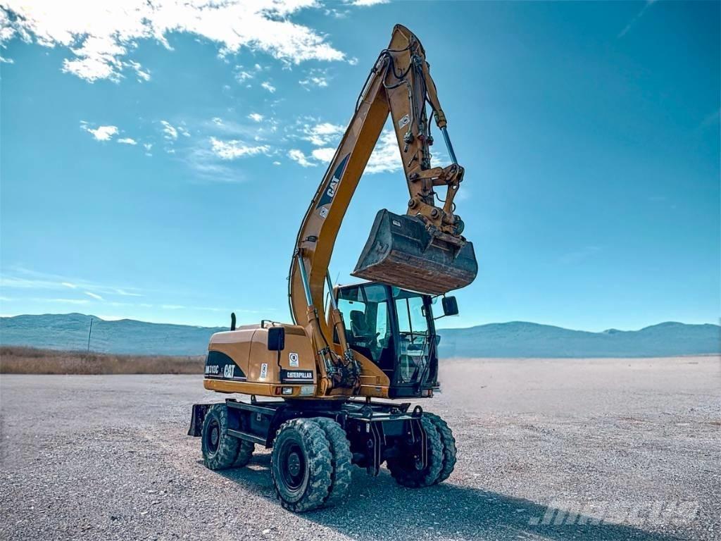 CAT M 313 C Escavadoras de rodas