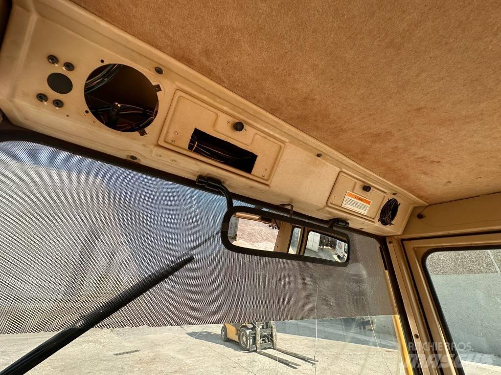 CAT 140 H Cabina