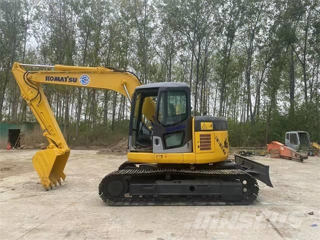Komatsu PC128US Escavadeiras de esteiras