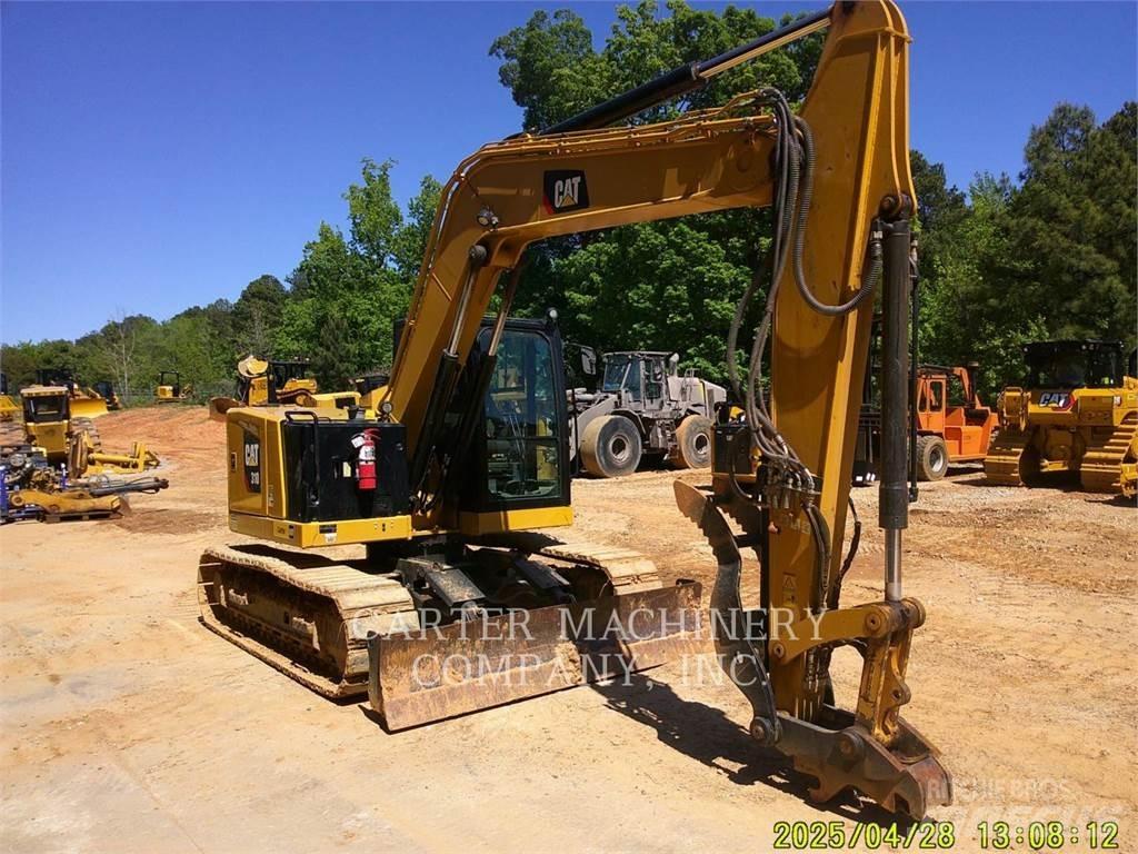 CAT 310 Miniescavadeiras