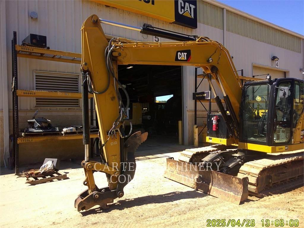 CAT 310 Miniescavadeiras