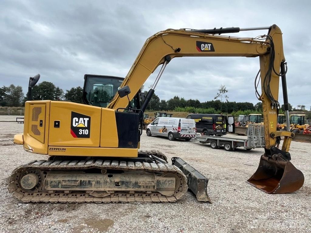 CAT 310 Escavadoras Midi 7t - 12t