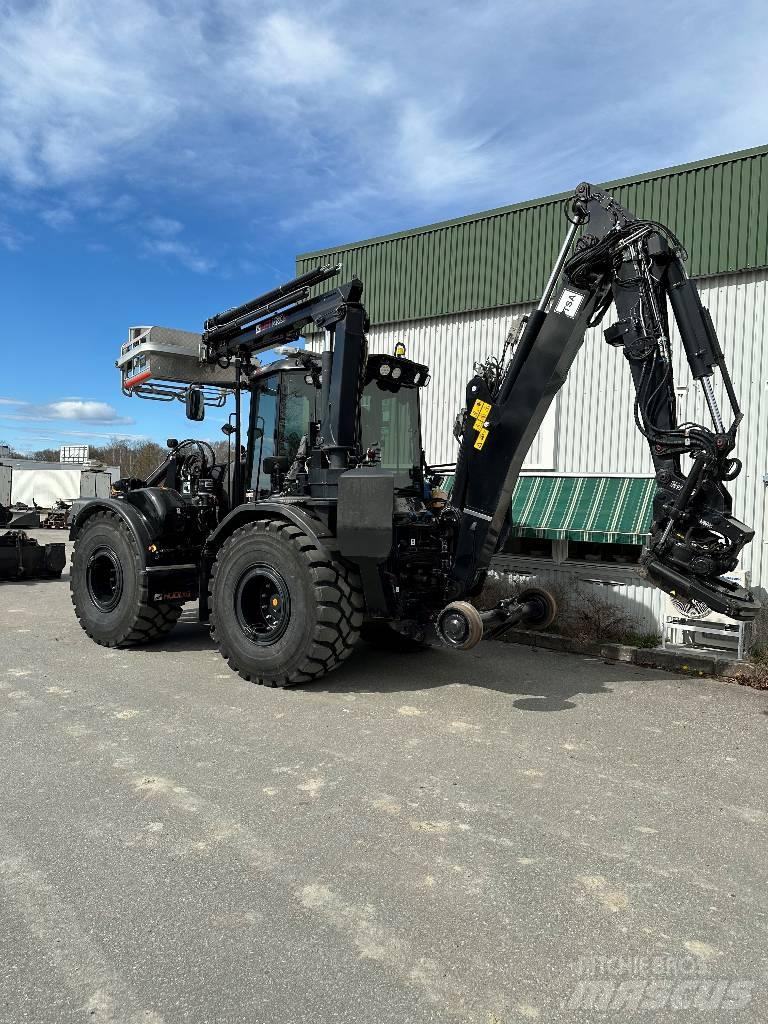 Huddig 1260D Rail Retroescavadeiras