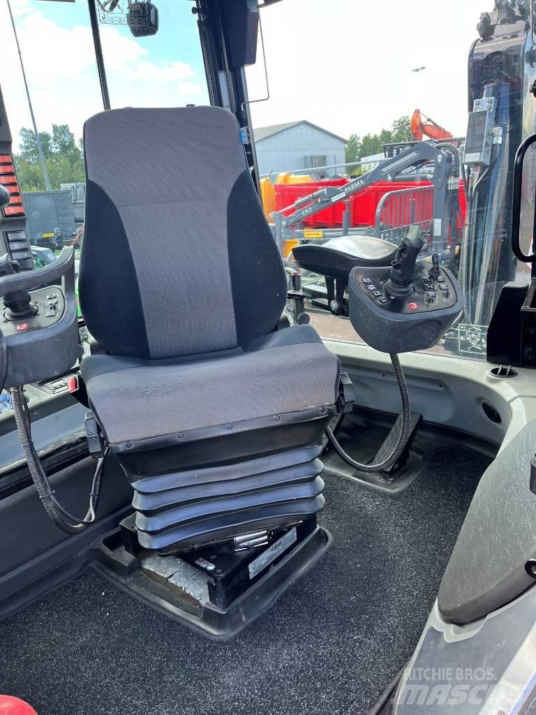Huddig 1260C City Retroescavadeiras