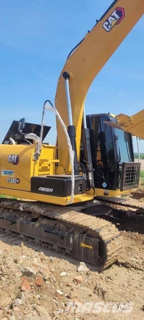 CAT 313 Escavadoras Midi 7t - 12t