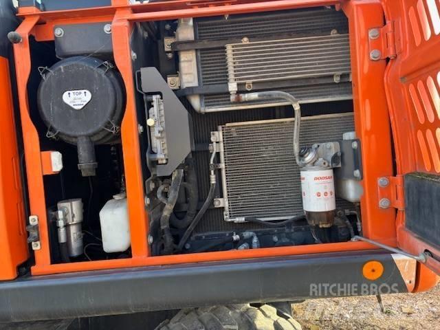  Dosan DX 140 Retroescavadeiras