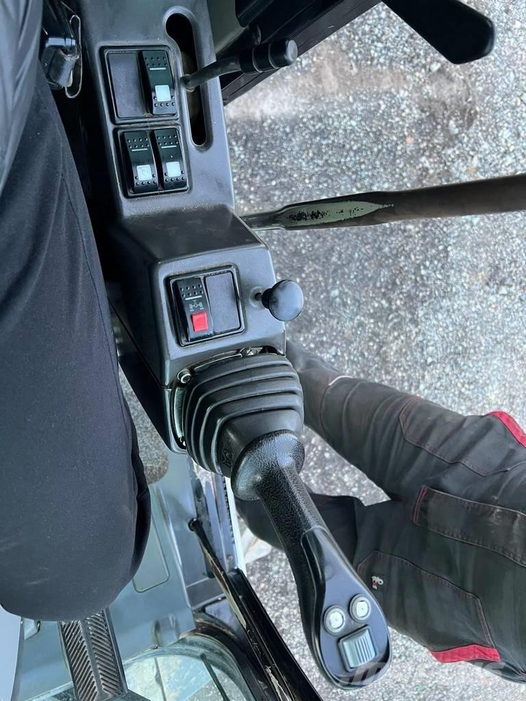 CAT M 313 D Escavadoras de rodas