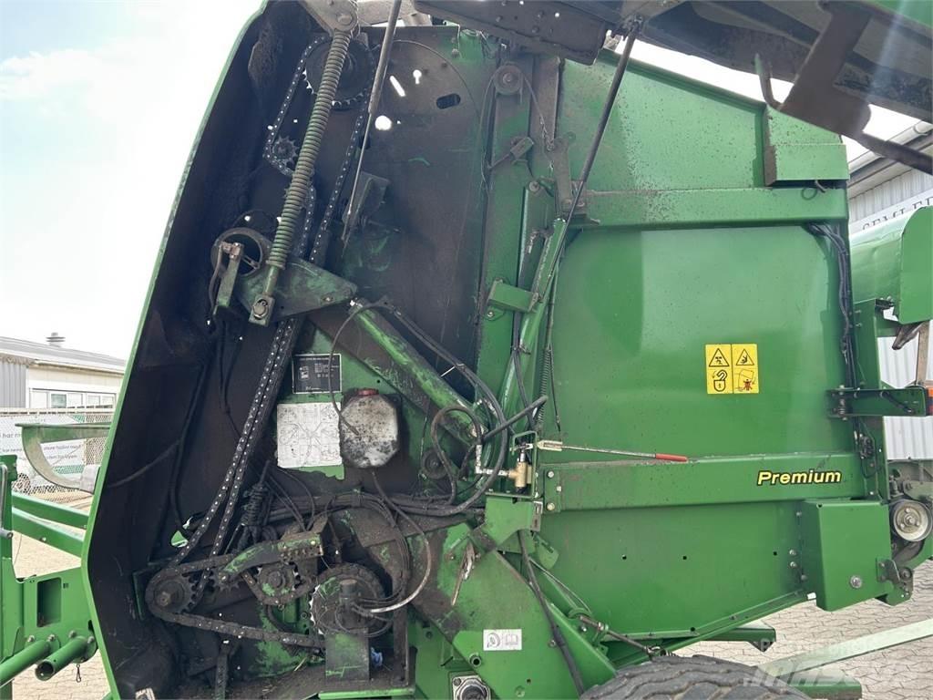 John Deere 864 Enfardadeira de rolos