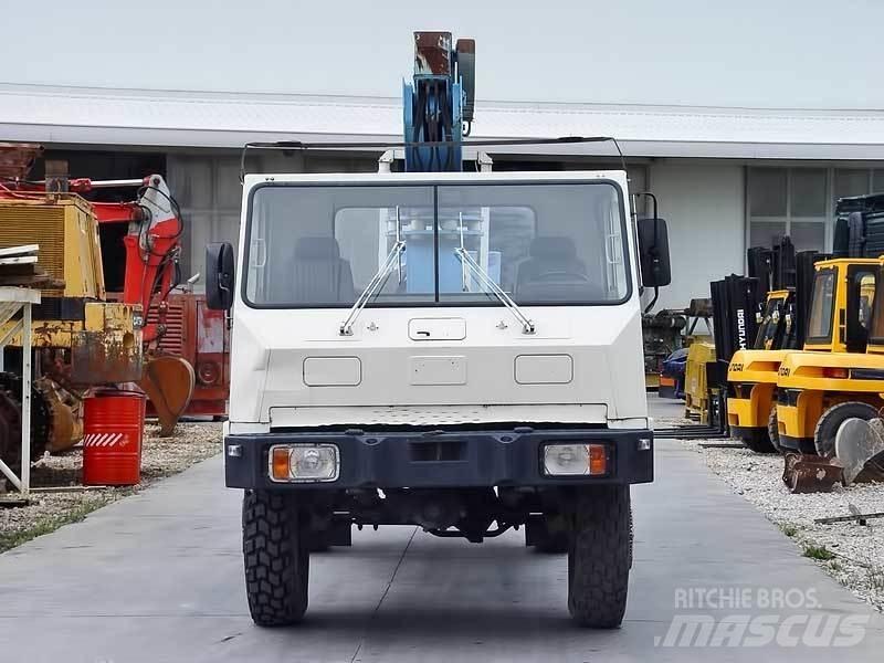 TCMMULTI . Elevadores braços articulados