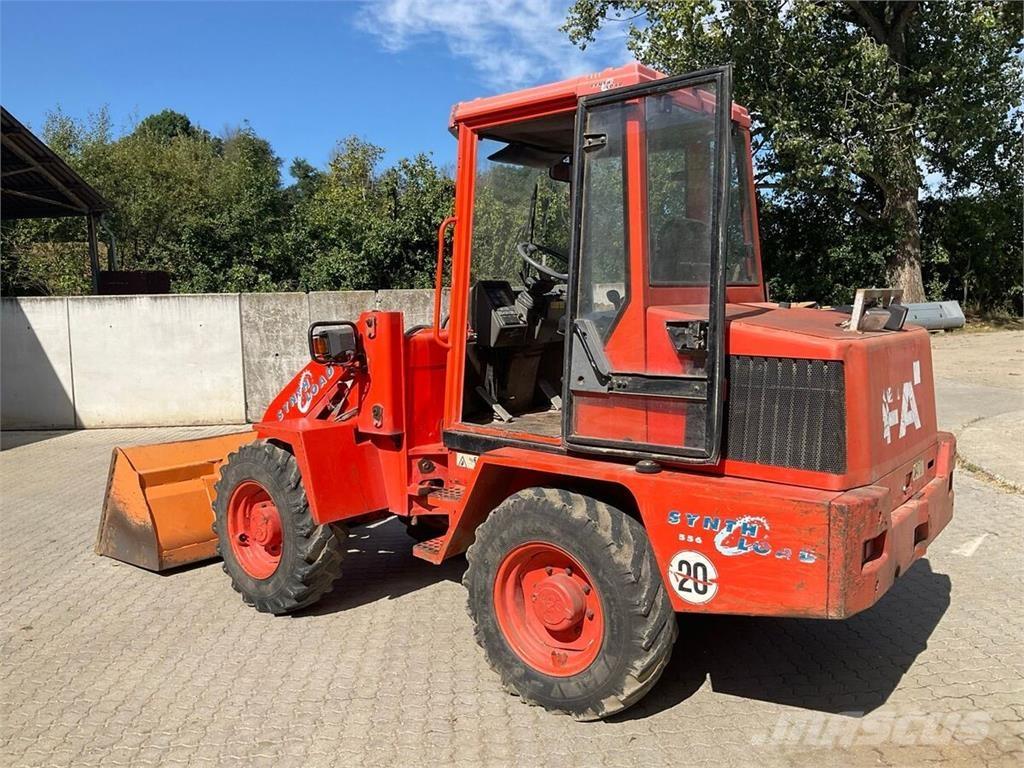 Fai 556 Carregadoras frontais e escavadoras