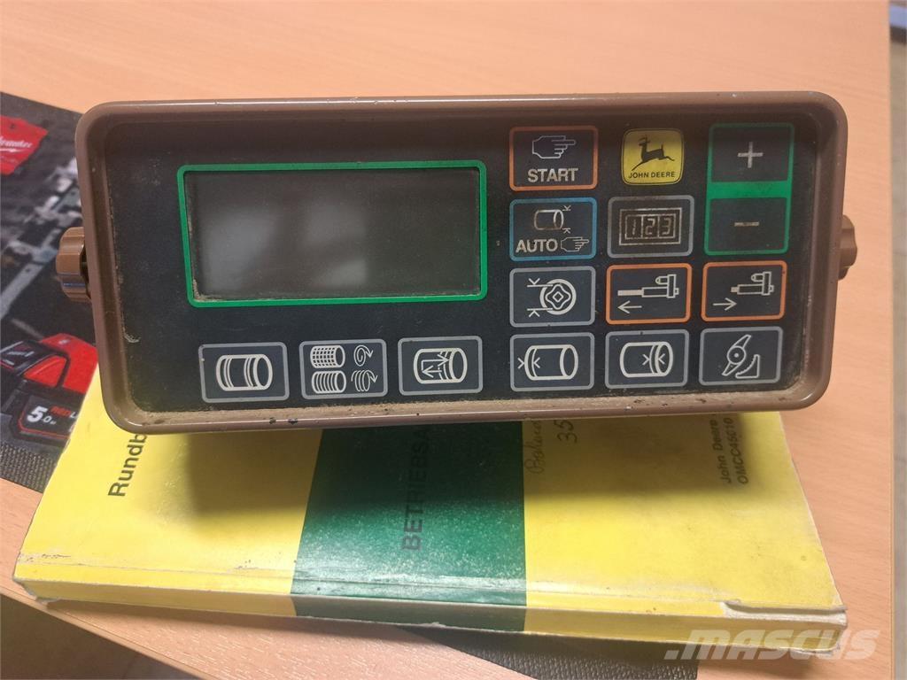 John Deere 570 Enfardadeira de rolos