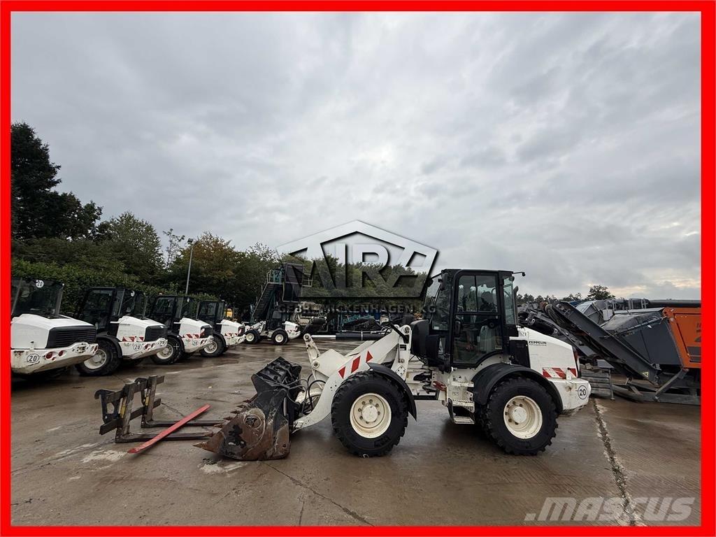 CAT 908M Carregadeiras de rodas